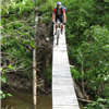 Riding across the creek before the swamp