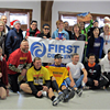post-race runners with banner